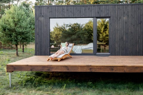 Modern garden room with bi-fold doors and outdoor deck